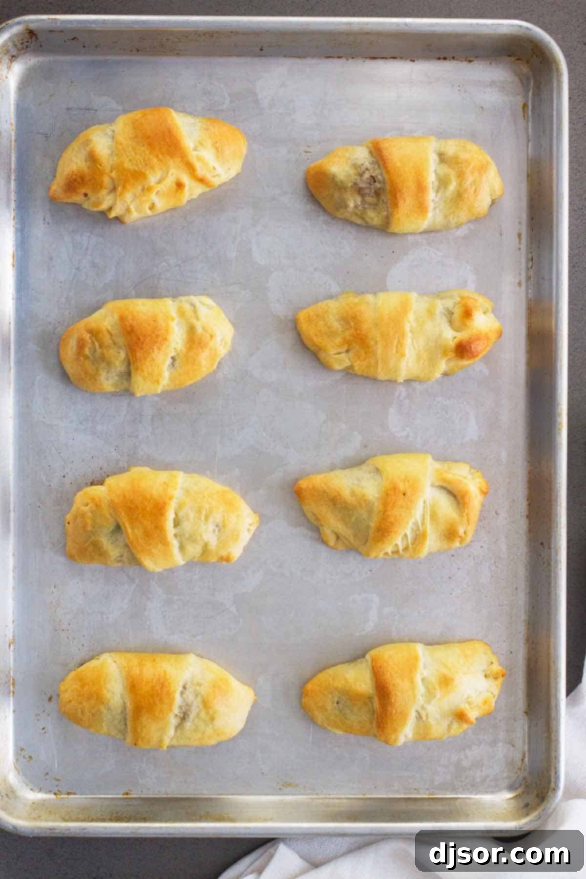 Savory Beef and Cabbage Rolls 3 Overhead shot of freshly baked Cabbage and Beef Bundles arranged on a platter, ready to serve.