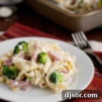 Creamy Ham and Broccoli Pasta Bake 3 Ham and Broccoli Pasta Bake on a plate with the baking dish in the back.