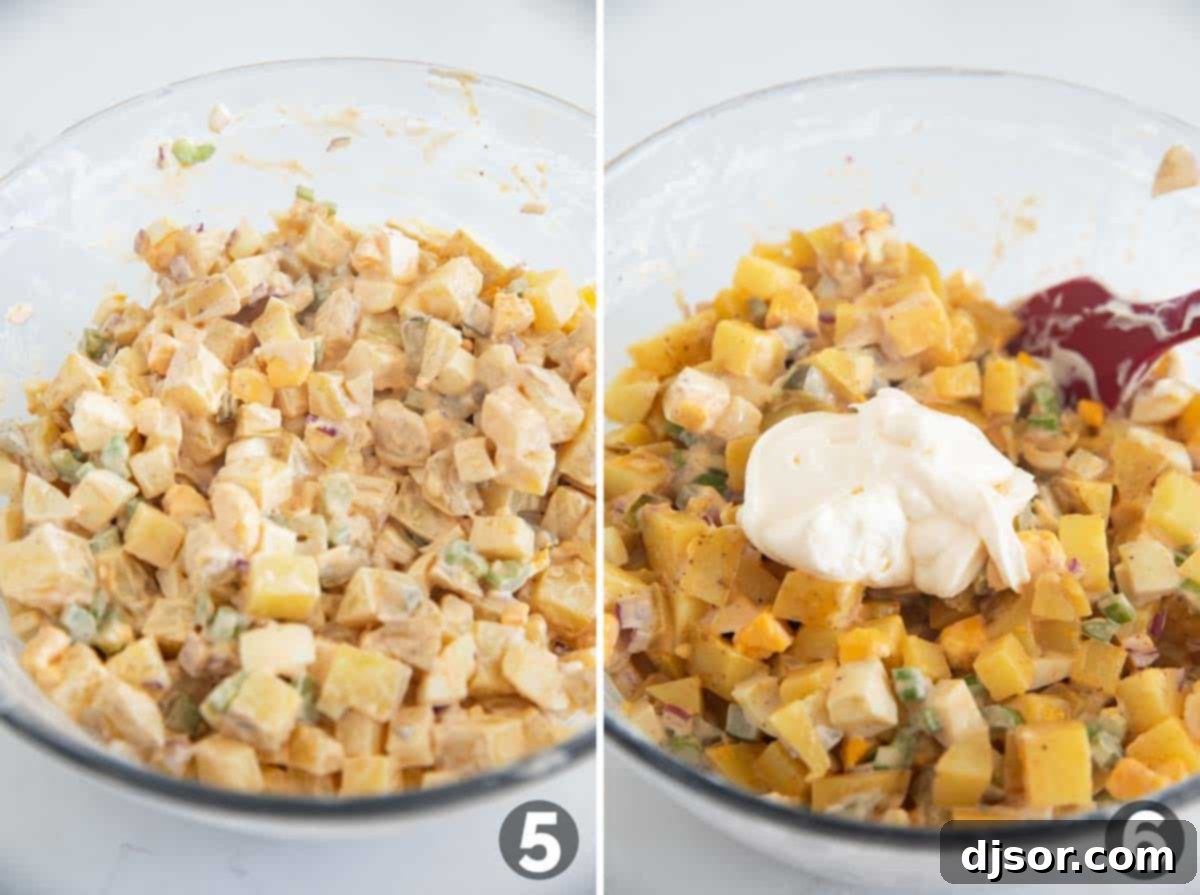 Classic Creamy Potato Salad 6 A close-up shot of all the potato salad ingredients thoroughly mixed together in a large bowl, showcasing the rich, creamy texture and vibrant flecks of vegetables and eggs. The dressing perfectly coats every piece, indicating a well-prepared and flavorful salad, ready for chilling.