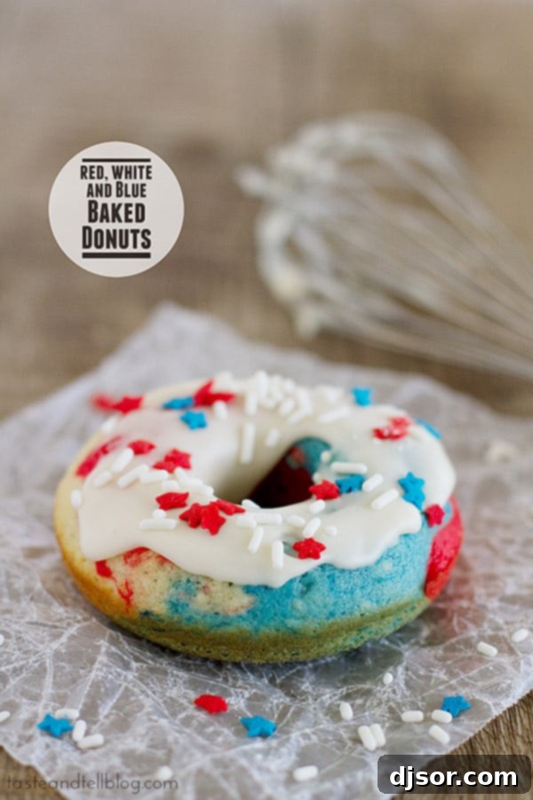 Jiggly Jell-O Poke Cupcakes 8 Patriotic red, white, and blue baked donuts, a delightful breakfast or dessert option.