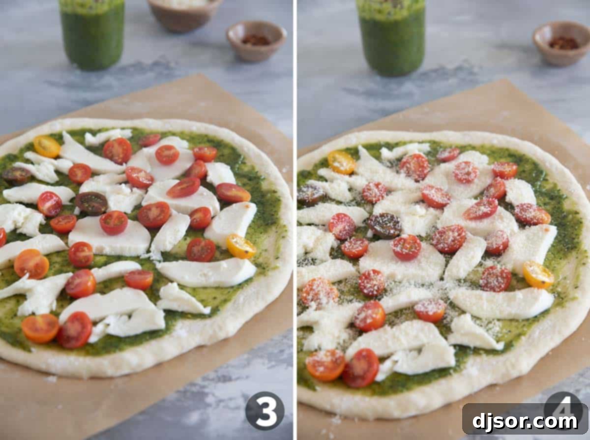 A partially assembled Pesto Pizza showcasing a vibrant layer of green pesto spread over the pizza dough, generously topped with glistening fresh mozzarella cheese and neatly arranged halved cherry tomatoes, ready for baking.