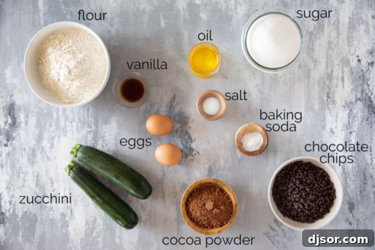 A selection of fresh ingredients laid out on a kitchen counter, ready for making Chocolate Zucchini Bread.
