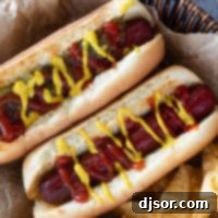 Crispy Air Fried Hot Dogs 8 Two Air Fryer Hot Dogs with potato chips.