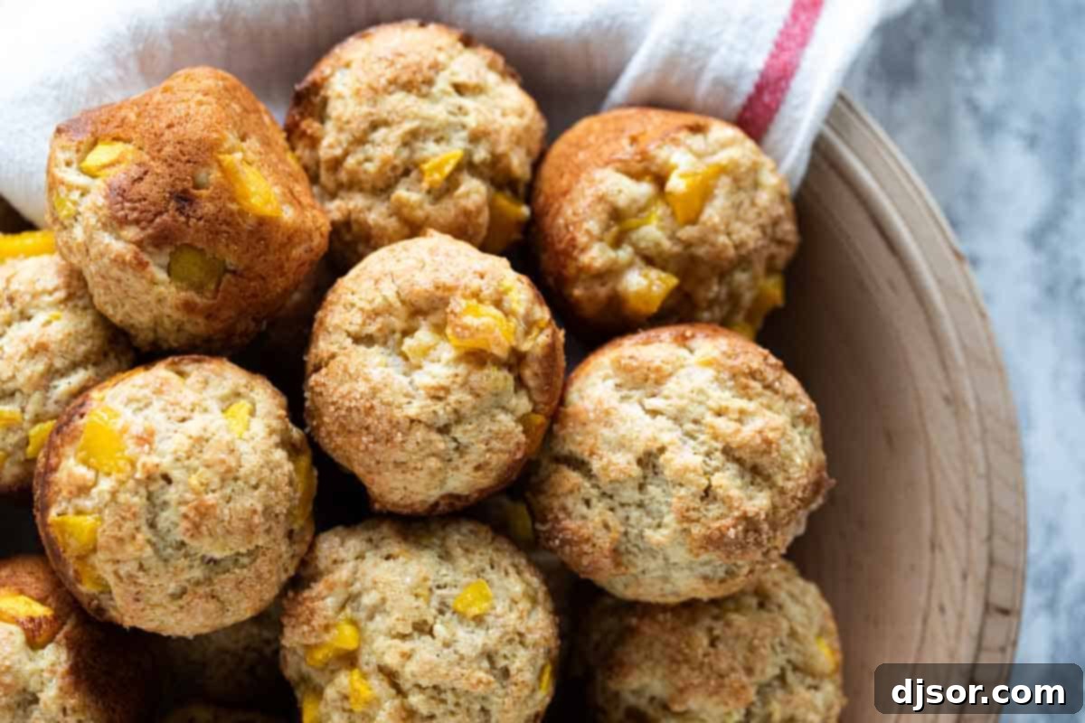 wooden bowl filled with mango muffins with banana
