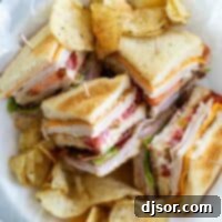 overhead view of cut up club sandwich in a basket