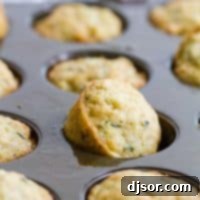 zucchini muffins in a muffin tin