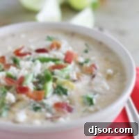 Smoky Chipotle Corn Chowder 4 Bowl of Chipotle Corn Chowder topped with bacon, green onions, and cheese.
