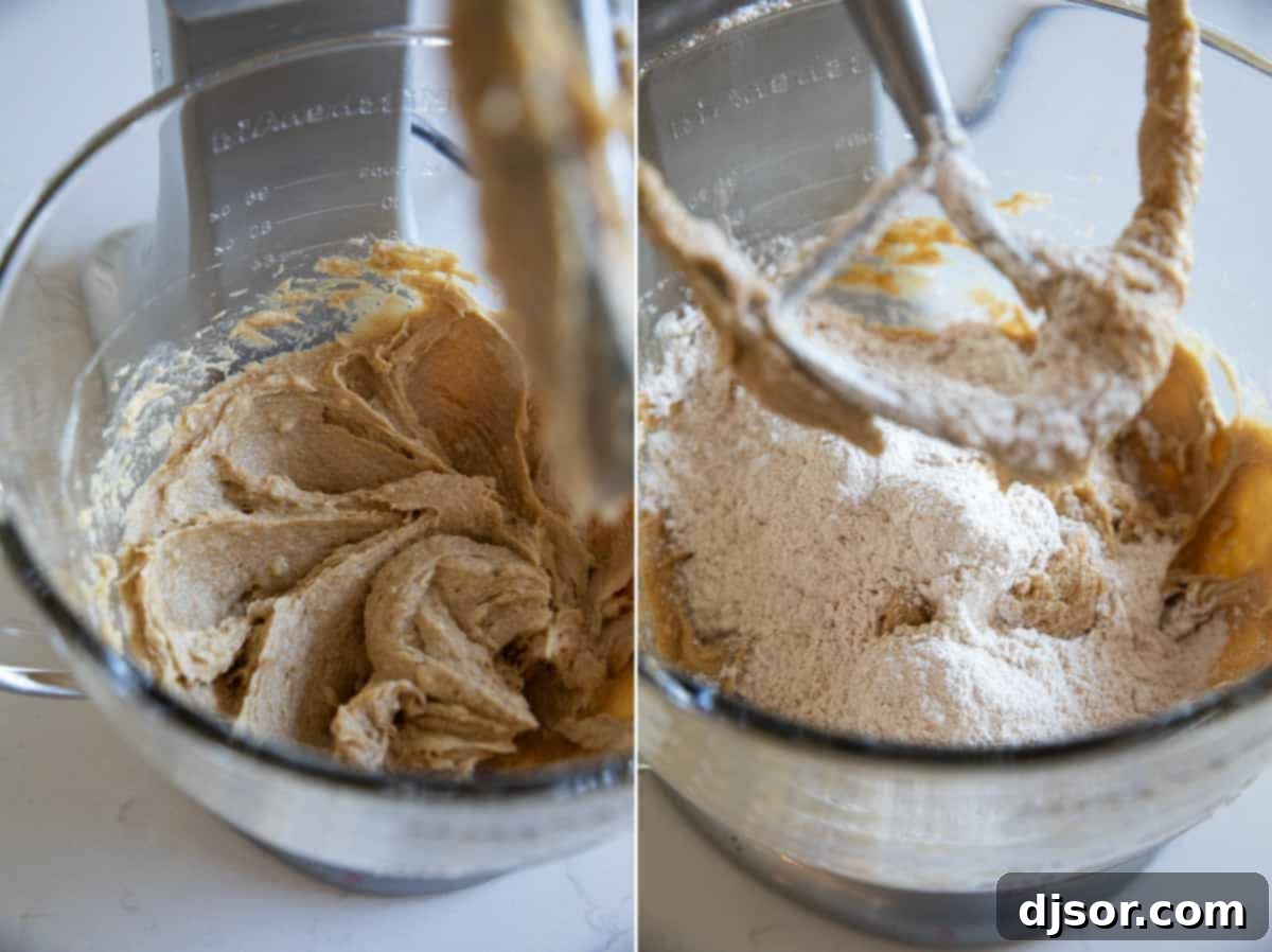 Chewy Coconut Oat Delights 4 Mixing bowl with creamed butter, sugar, and eggs, with flour being added, for Oatmeal Coconut Cookies.
