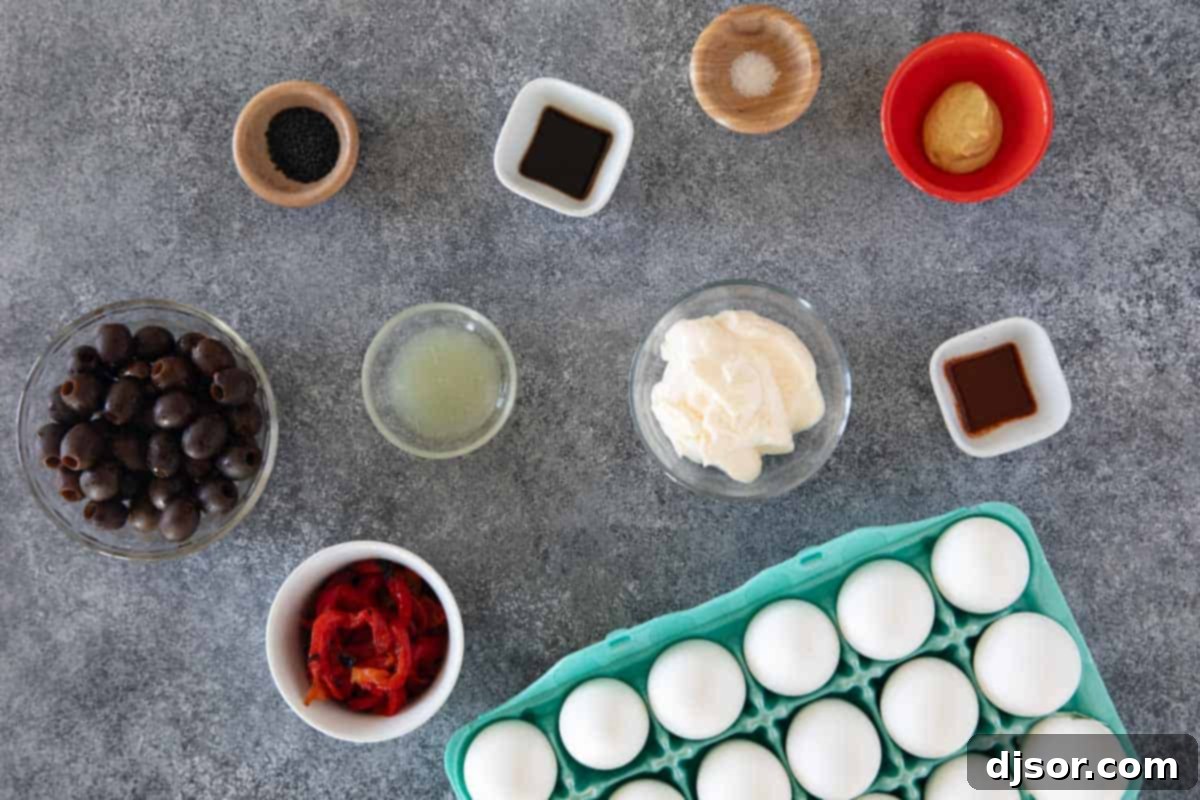 Ghastly Deviled Eggs 3 Close-up of ingredients for Halloween Deviled Eggs laid out on a wooden surface.