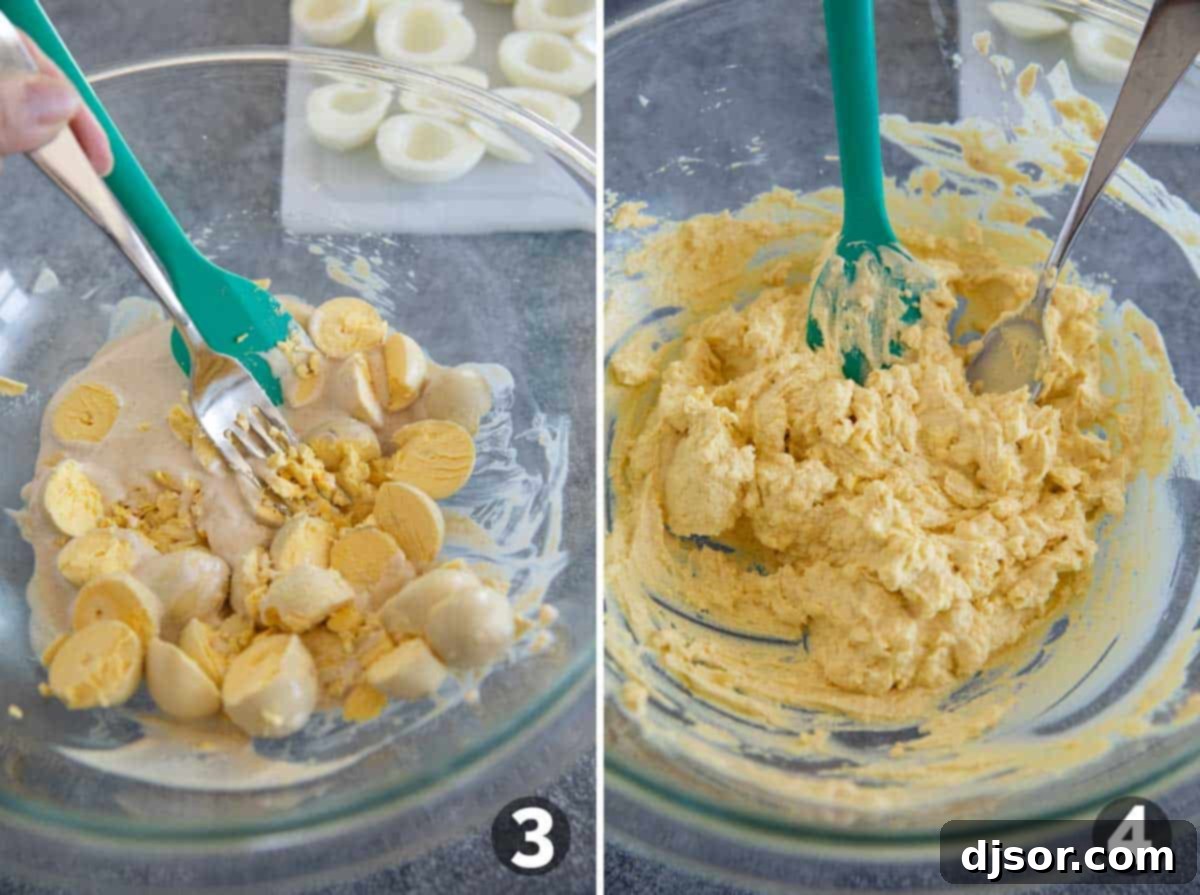 Ghastly Deviled Eggs 5 Preparation image showing egg yolks being mashed into the creamy mayonnaise mixture for Halloween Deviled Eggs.