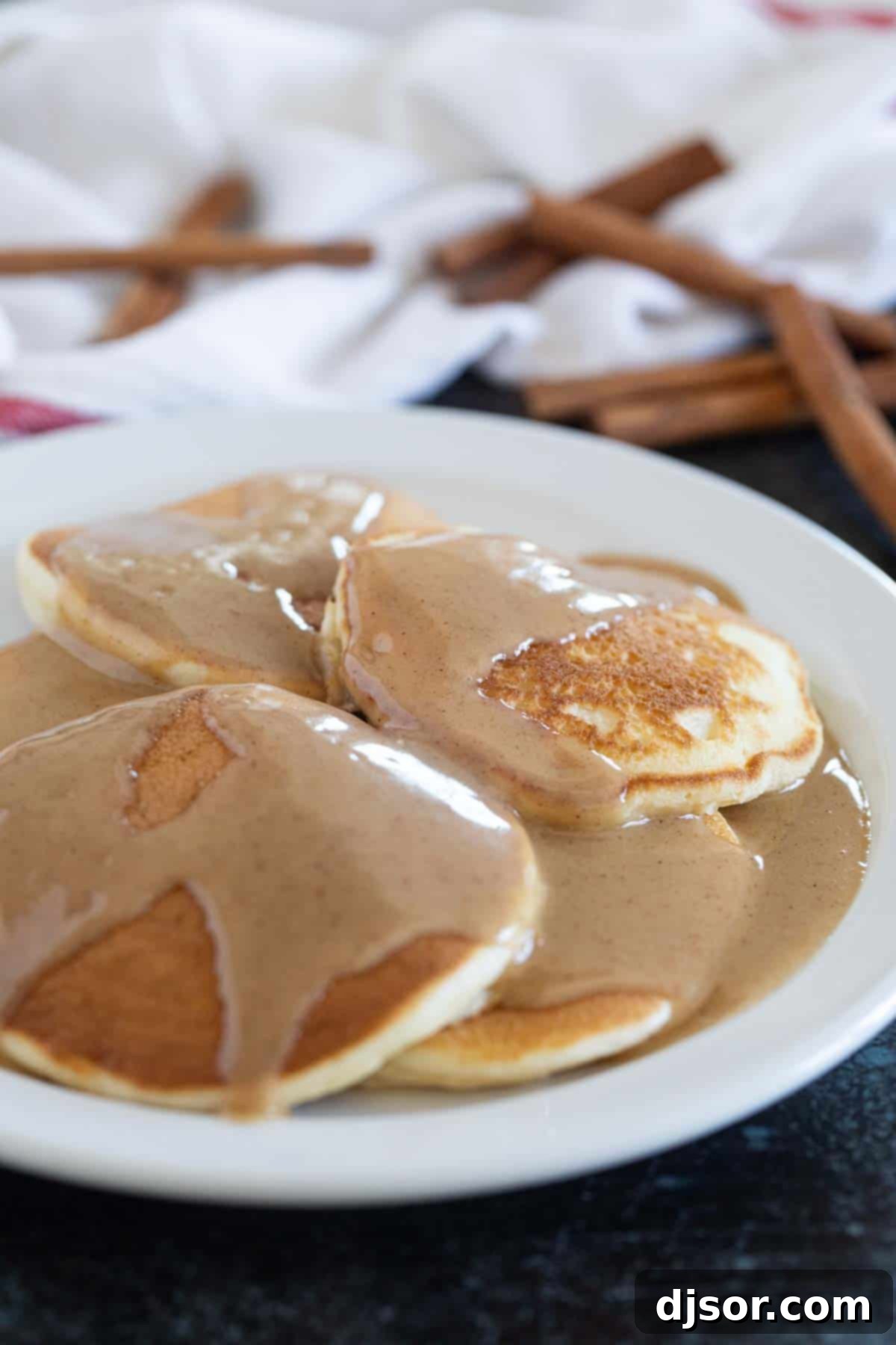 Velvet Cinnamon Nectar 7 Pancakes topped with Cinnamon Syrup.