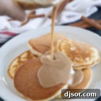 Velvet Cinnamon Nectar 8 Pouring cinnamon syrup onto pancakes.