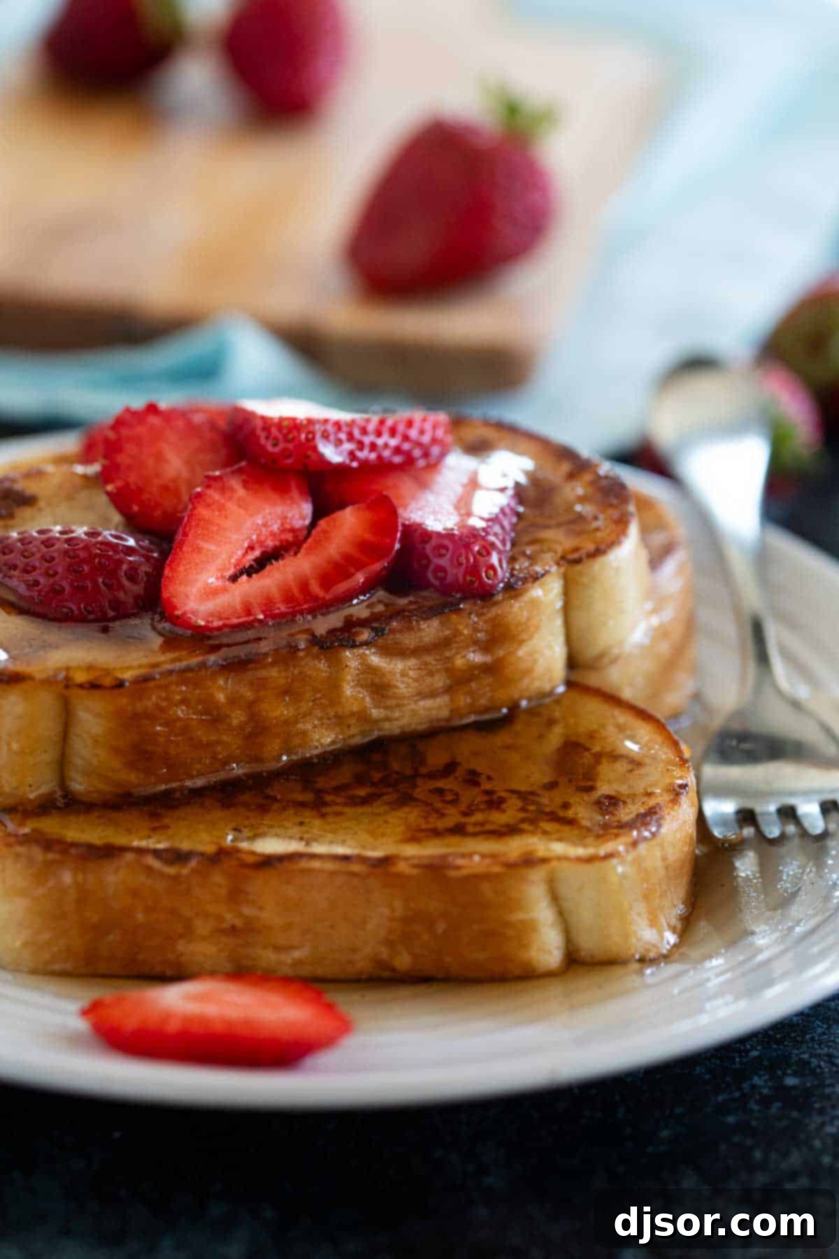 Golden Griddle Slices 9 Slices of French Toast topped with syrup and berries.