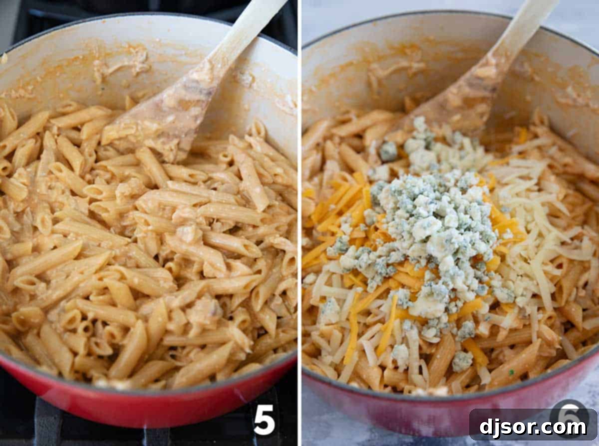 Ultimate Buffalo Chicken Pasta 6 Stirring buffalo chicken pasta in a pot, then adding cheese.
