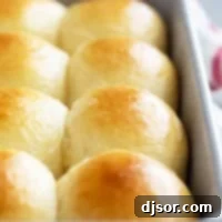 Baked Brioche Rolls in a baking dish.