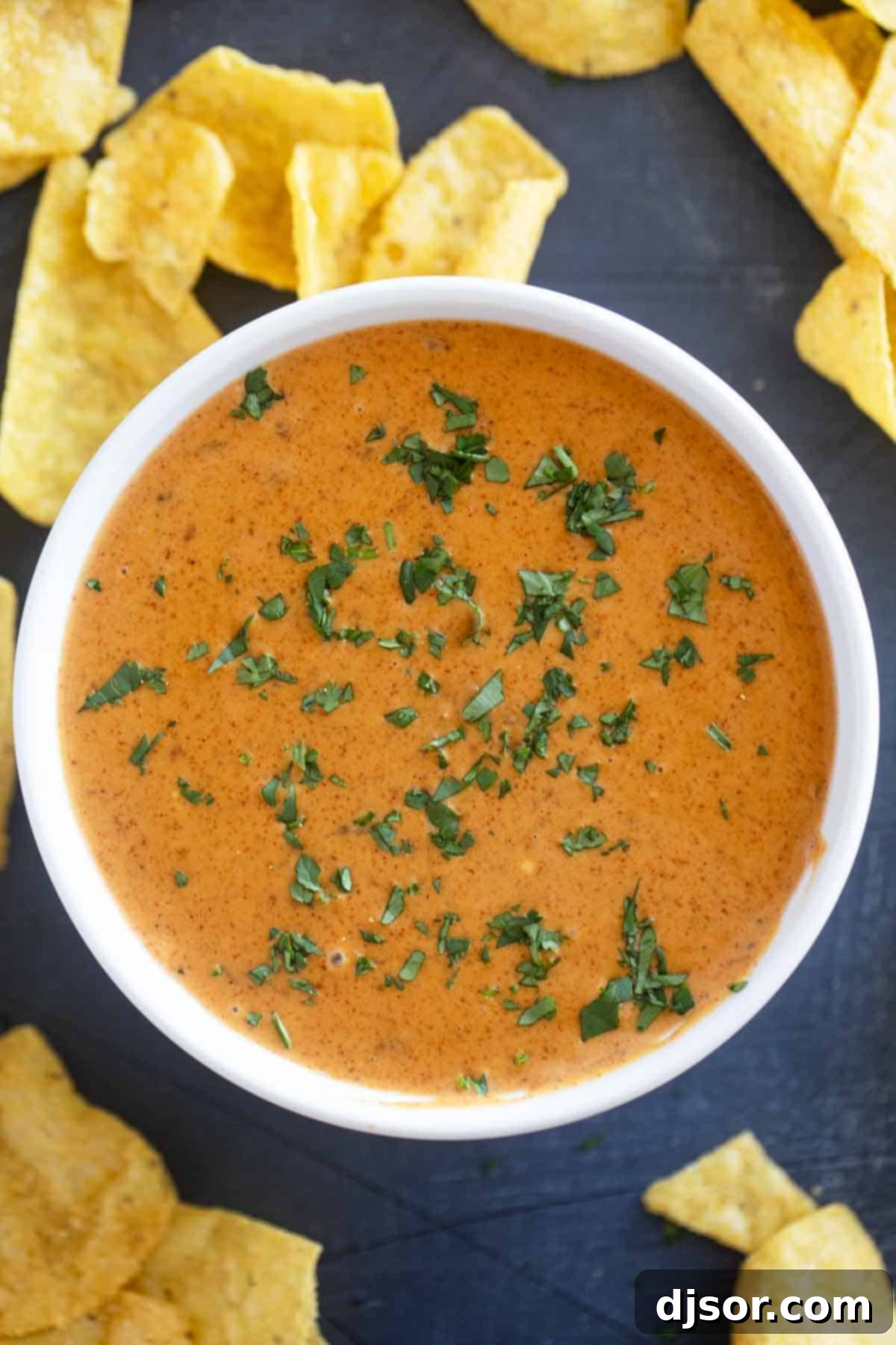 Bowl of Chili's Queso Dip topped with cilantro.