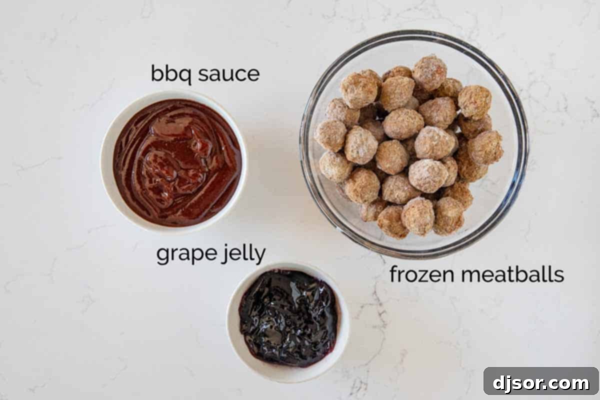 Ingredients for Crockpot BBQ Grape Jelly Meatballs laid out on a counter: frozen meatballs, grape jelly, and a bottle of BBQ sauce.