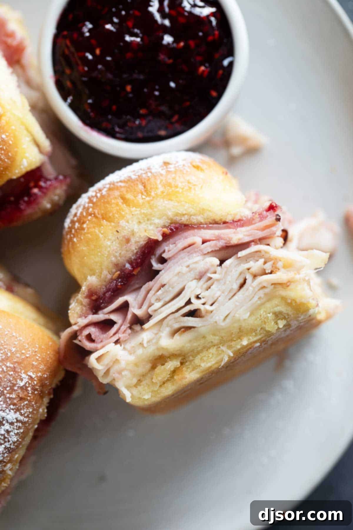 Sweet and Savory Monte Cristo Minis 6 Monte Cristo Slider turned on its side to show fillings.