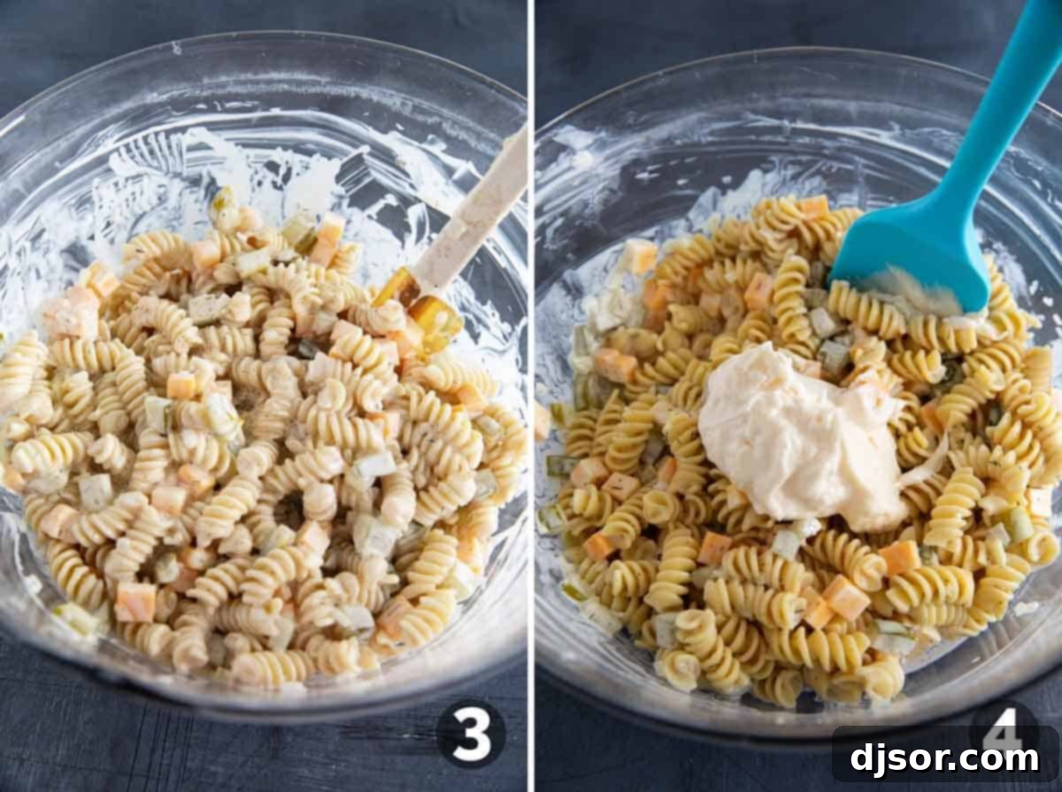 Briny Burst Pasta Salad 5 Mixing the cooled pasta with the creamy dill pickle dressing, along with cheese and chopped pickles.