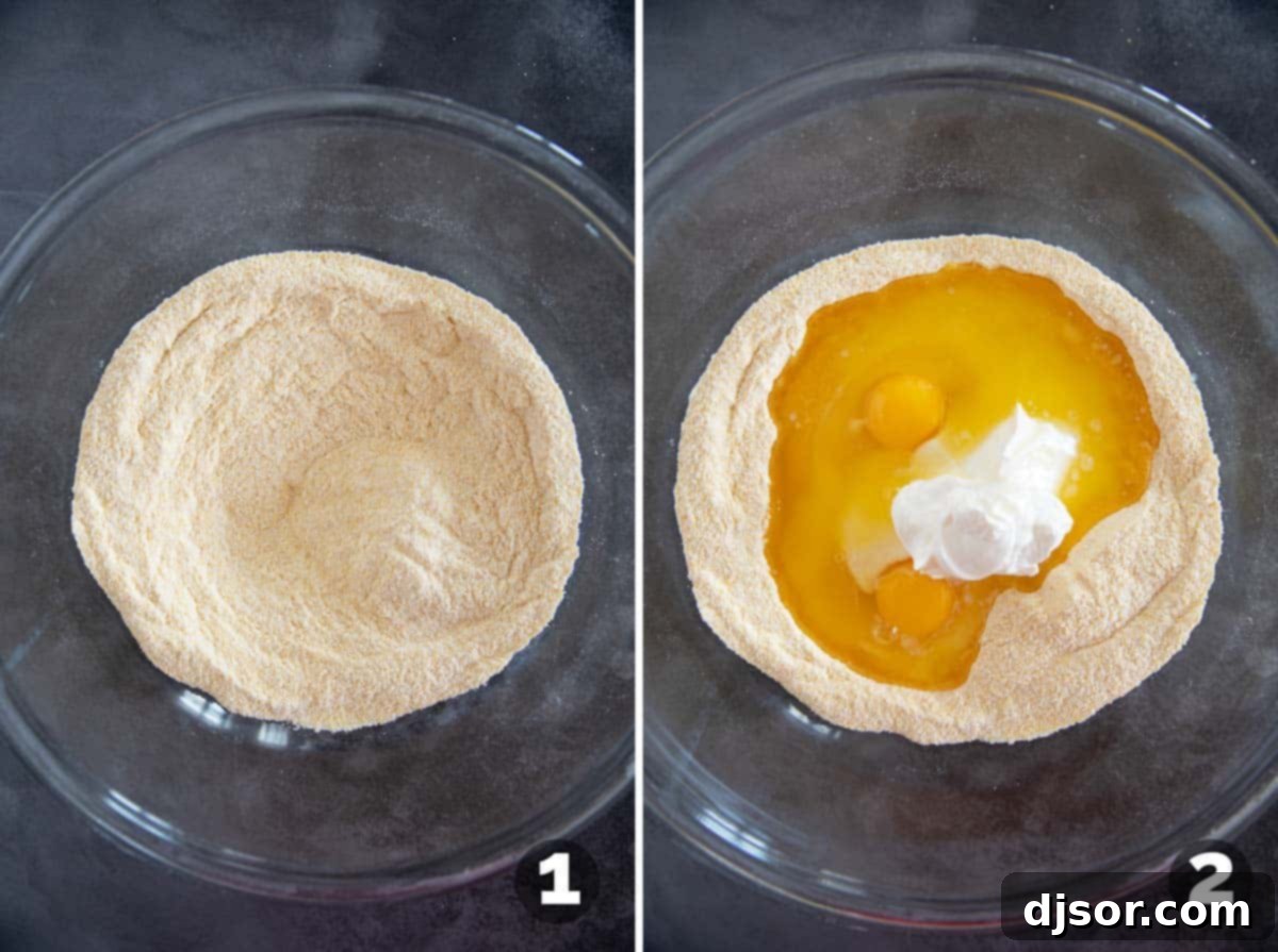 The process of mixing dry and wet ingredients for sour cream cornbread batter.