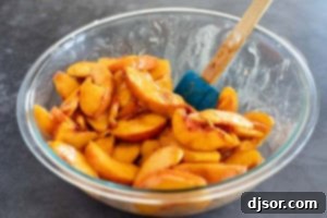 Making peach dump cake filling.