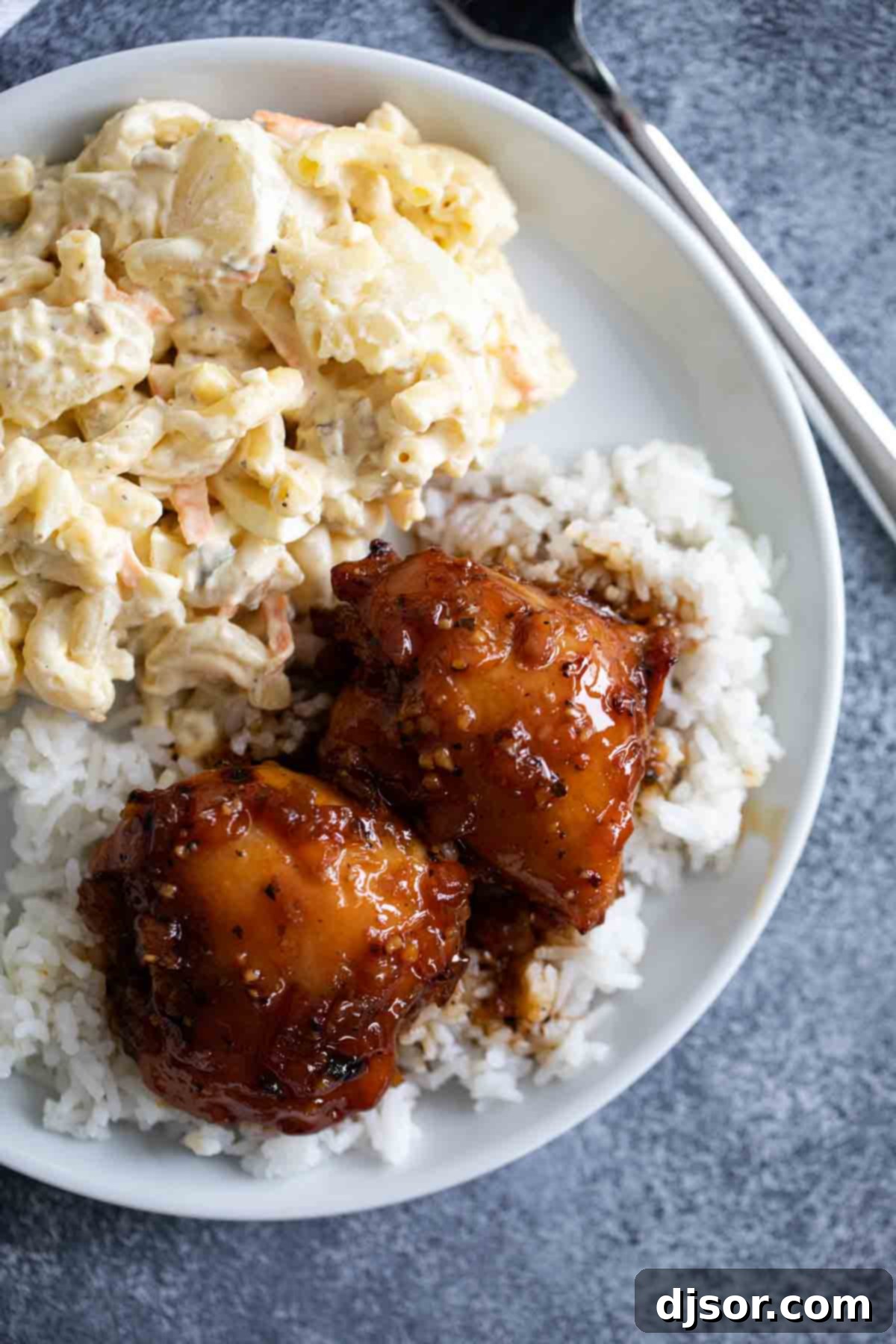 Overhead view of Shoyu Chicken with Hawaiian Macaroni Salad on a plate.
