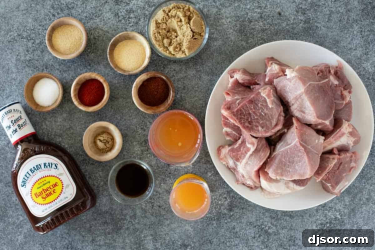All the essential ingredients neatly arranged on a counter, ready to be transformed into delicious Slow Cooker Pulled Pork.