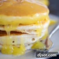 Zesty Lemon Sauce 2 Homemade Lemon Sauce for Pancakes or Waffles, vibrant and delicious.