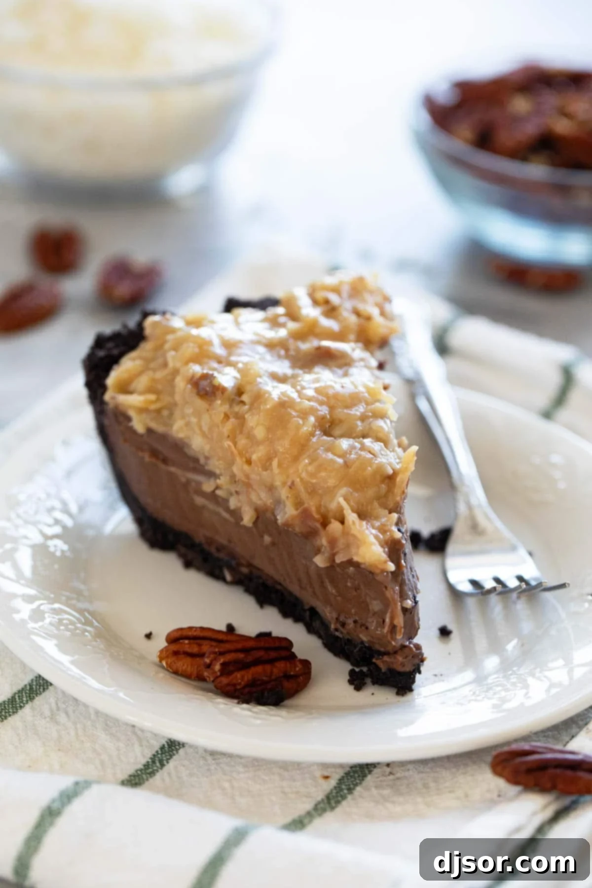 German Chocolate Indulgence 2 Slice of German Chocolate Pie topped with gooey coconut pecan topping, showcasing its rich layers.
