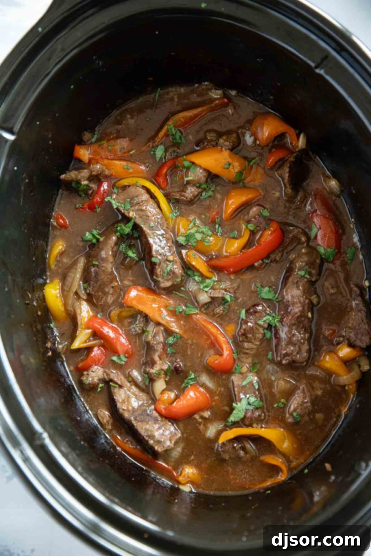 Fall-Apart Slow Cooker Pepper Steak 6 Slow Cooker Pepper Steak in a slow cooker.