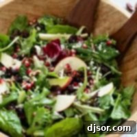 Thanksgiving Salad with apples, pomegranates, and an apple cider vinaigrette.