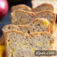 Slices of Mango Bread stacked next to each other.