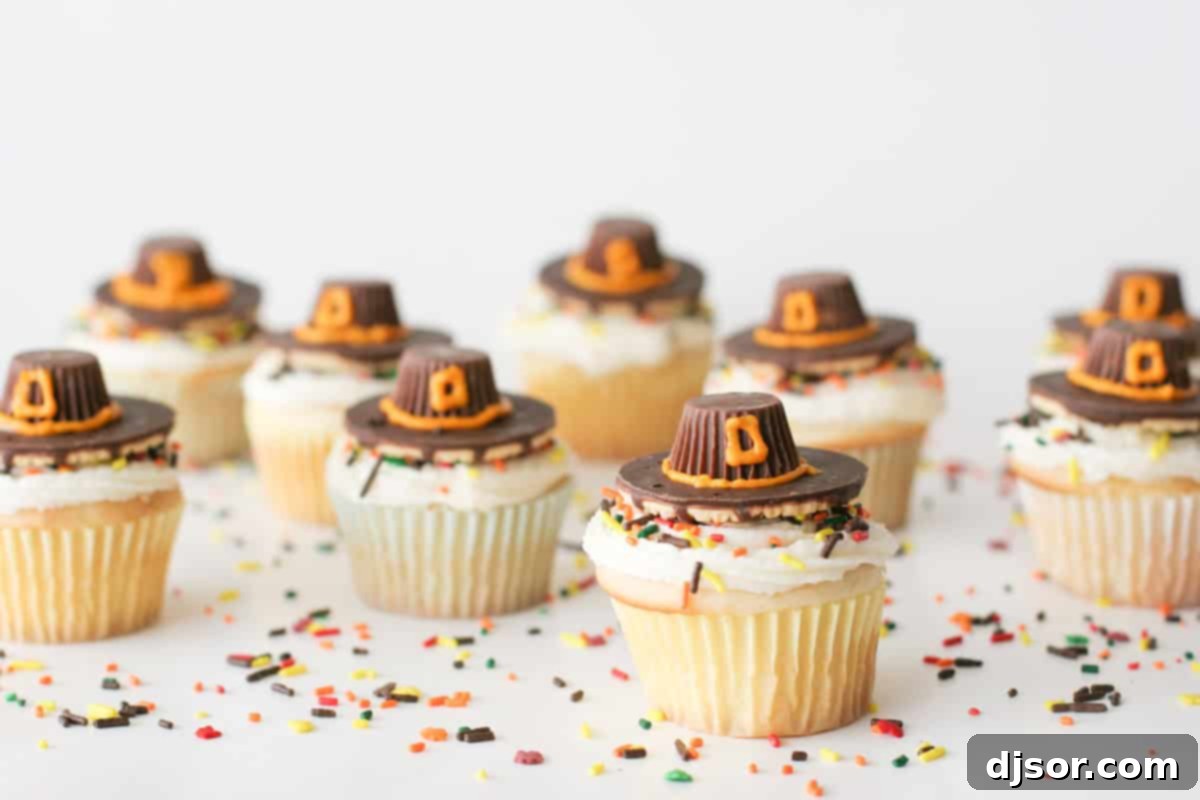 Gobble-Worthy Pilgrim Hat Cupcakes 2 Festive Pilgrim Hat Thanksgiving Cupcakes adorned with autumn sprinkles, showcasing the delightful edible hats.