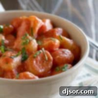 bowl with gnocchi with ricotta and tomato sauce topped with basil