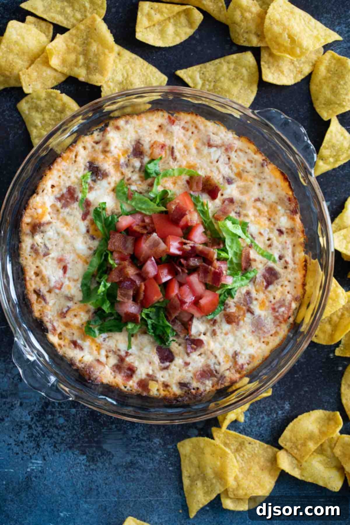 BLT Dip topped with lettuce and tomatoes