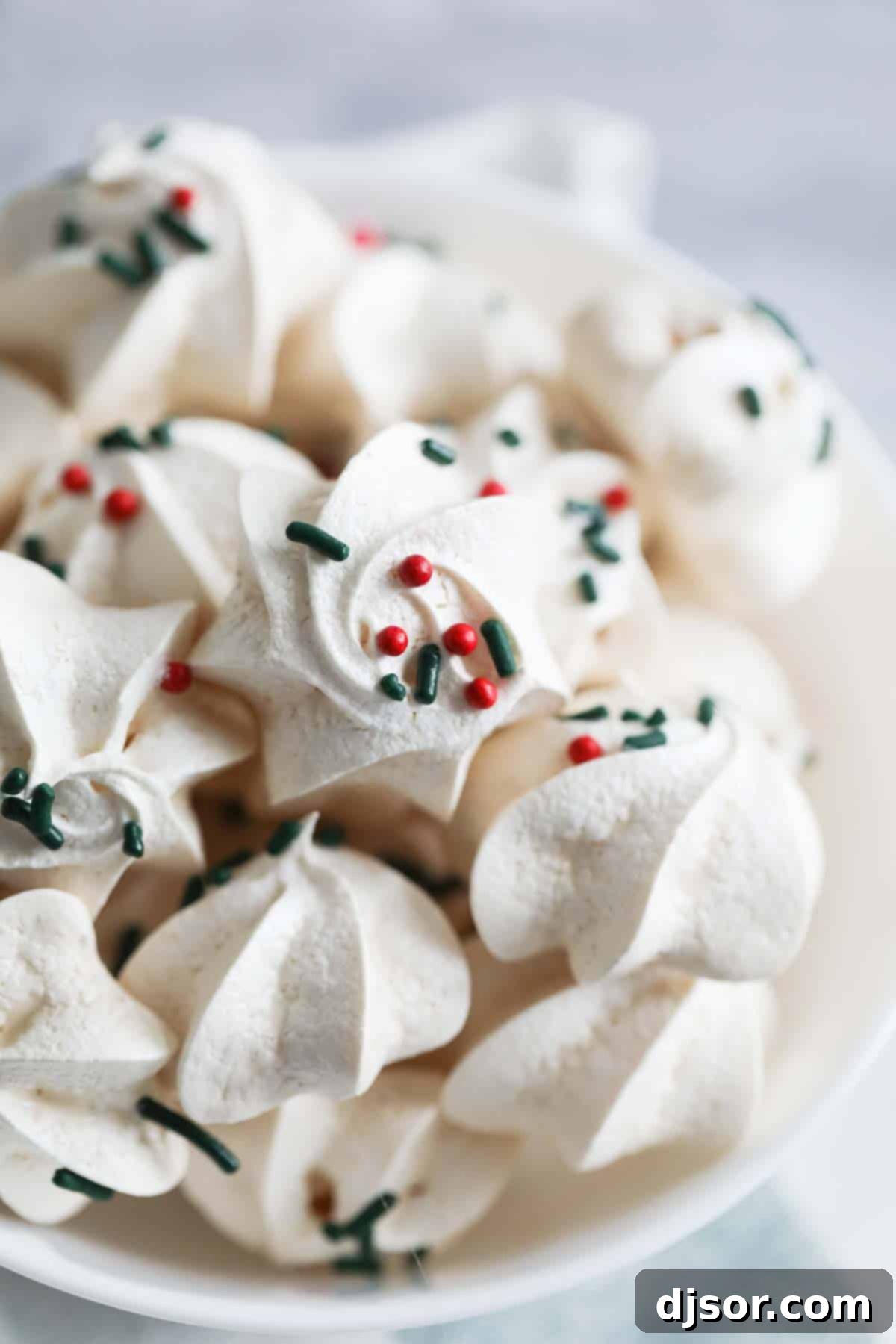 Close up of bowl of meringue cookies