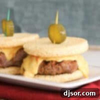 Pimiento Cheese Sliders – mini burgers topped with melted pimiento cheese and a pickle