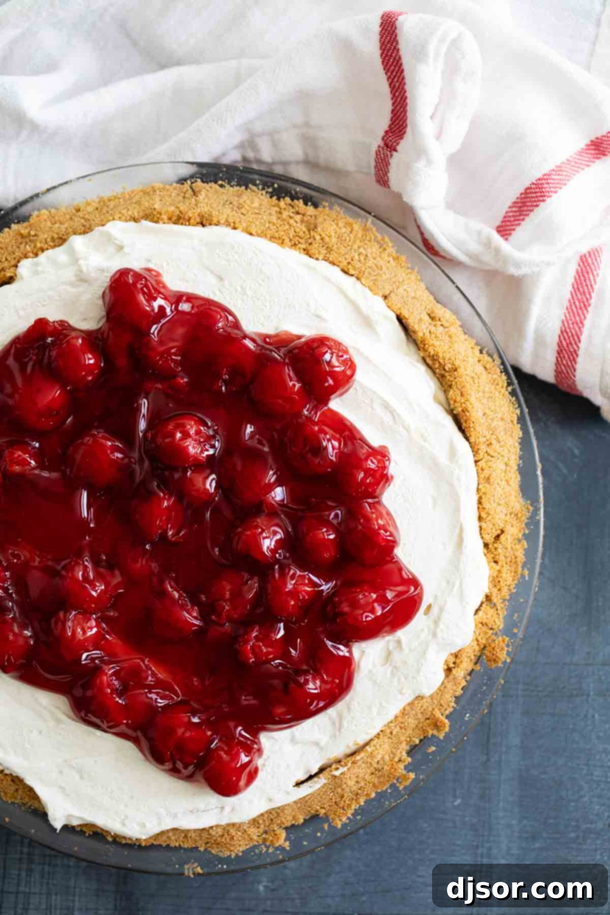 Creamy and smooth, this No Bake Cheesecake is the perfect summer dessert. A sweet cheesecake filling is set inside a graham cracker crust for an irresistible classic dessert. Top it with pie filling to take it up another notch! Philadelphia No Bake Cheesecake