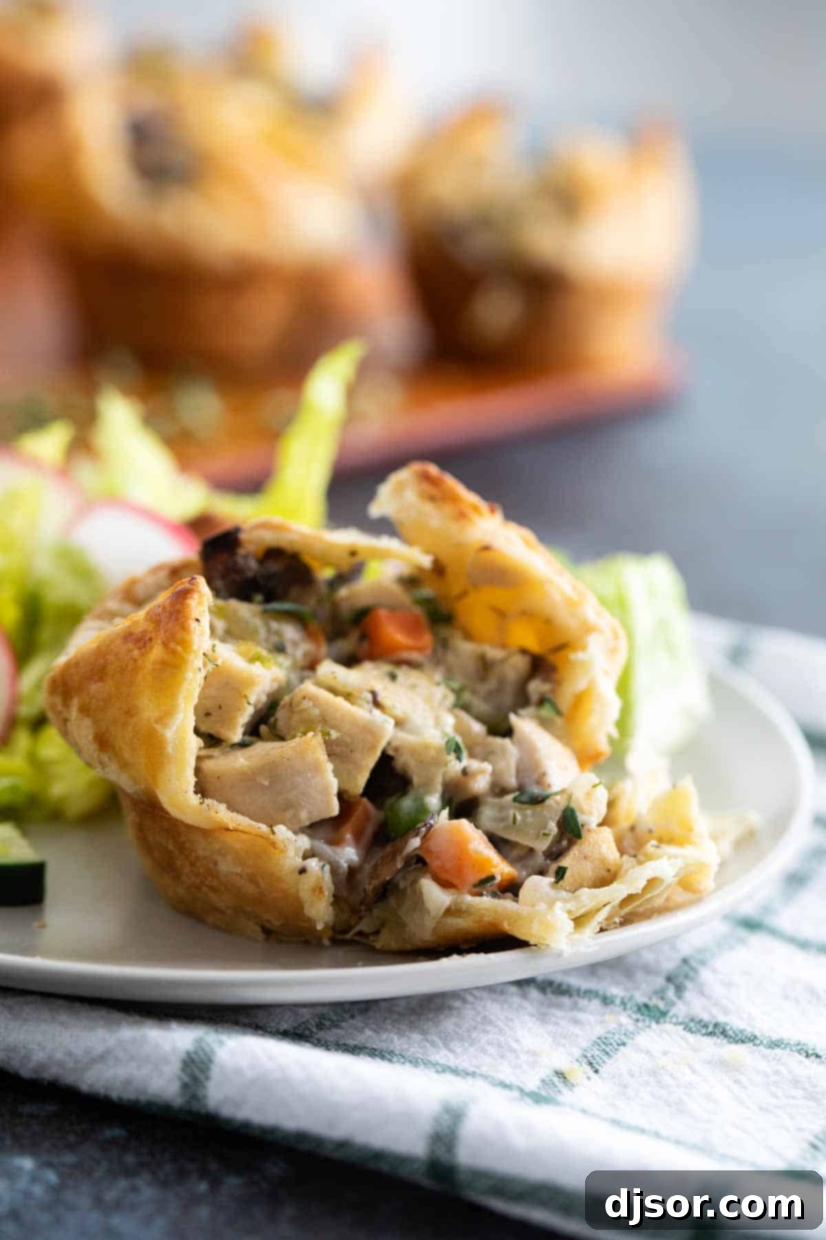 Mini Chicken Pot Pie with Puff Pastry on a plate, ready for serving.