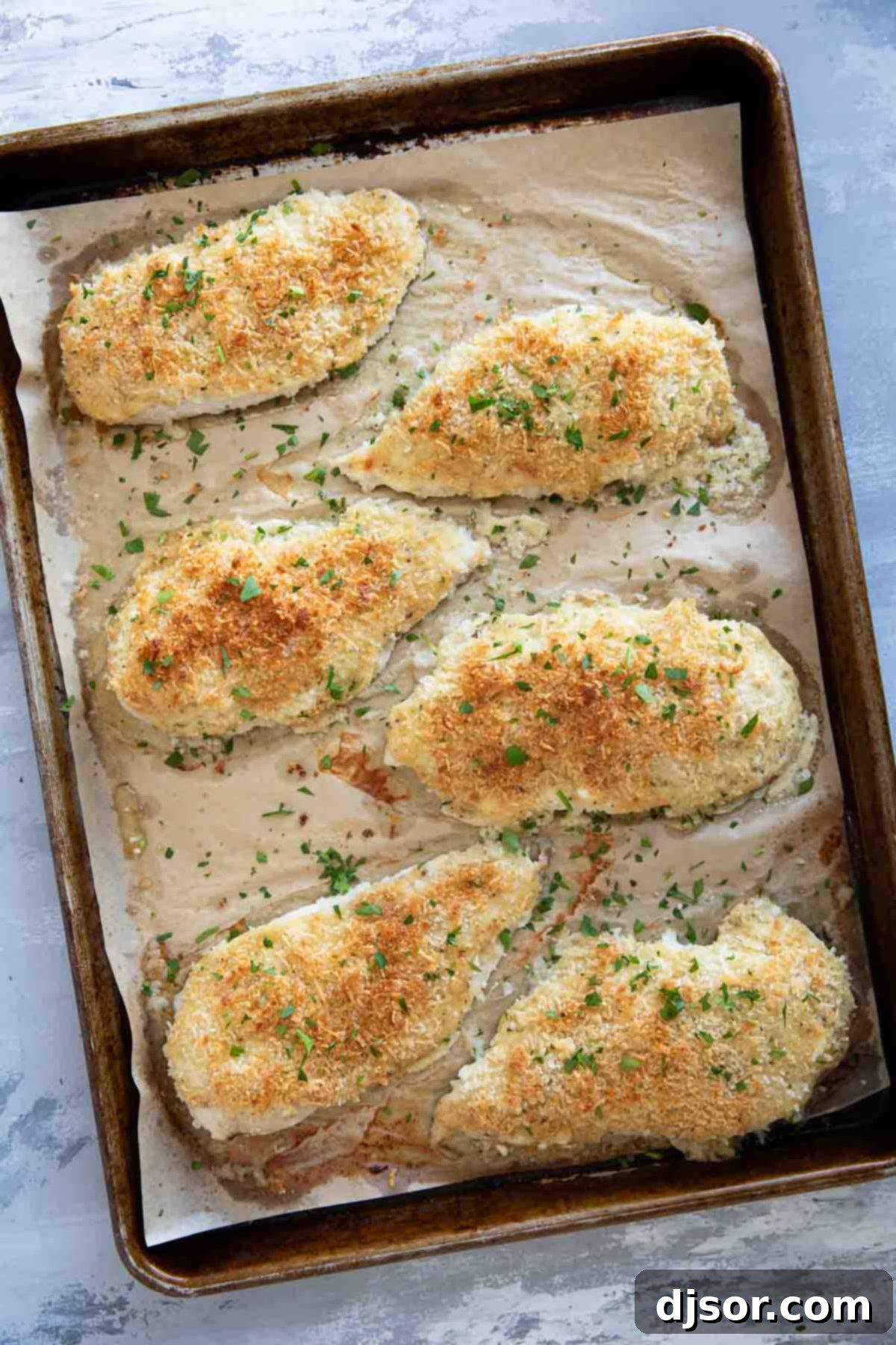 Crispy Mayo Chicken 6 Baking sheet with crunchy mayo chicken on parchment paper.