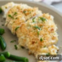 Crispy Mayo Chicken 8 Crunchy Mayo Chicken cut into slices and topped with parsley.