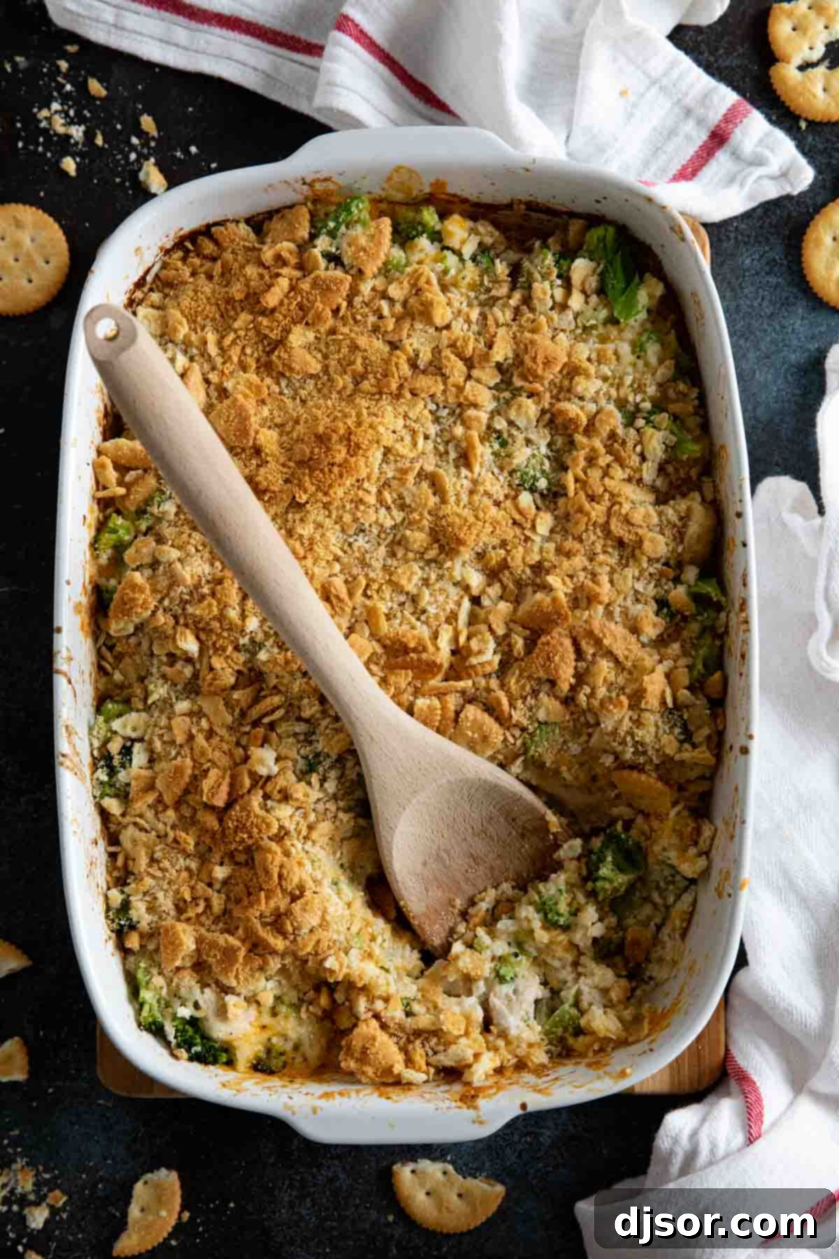 Overhead view of a large casserole dish filled with baked Chicken Divan, topped with golden-brown cracker crumbs, ready to be served.