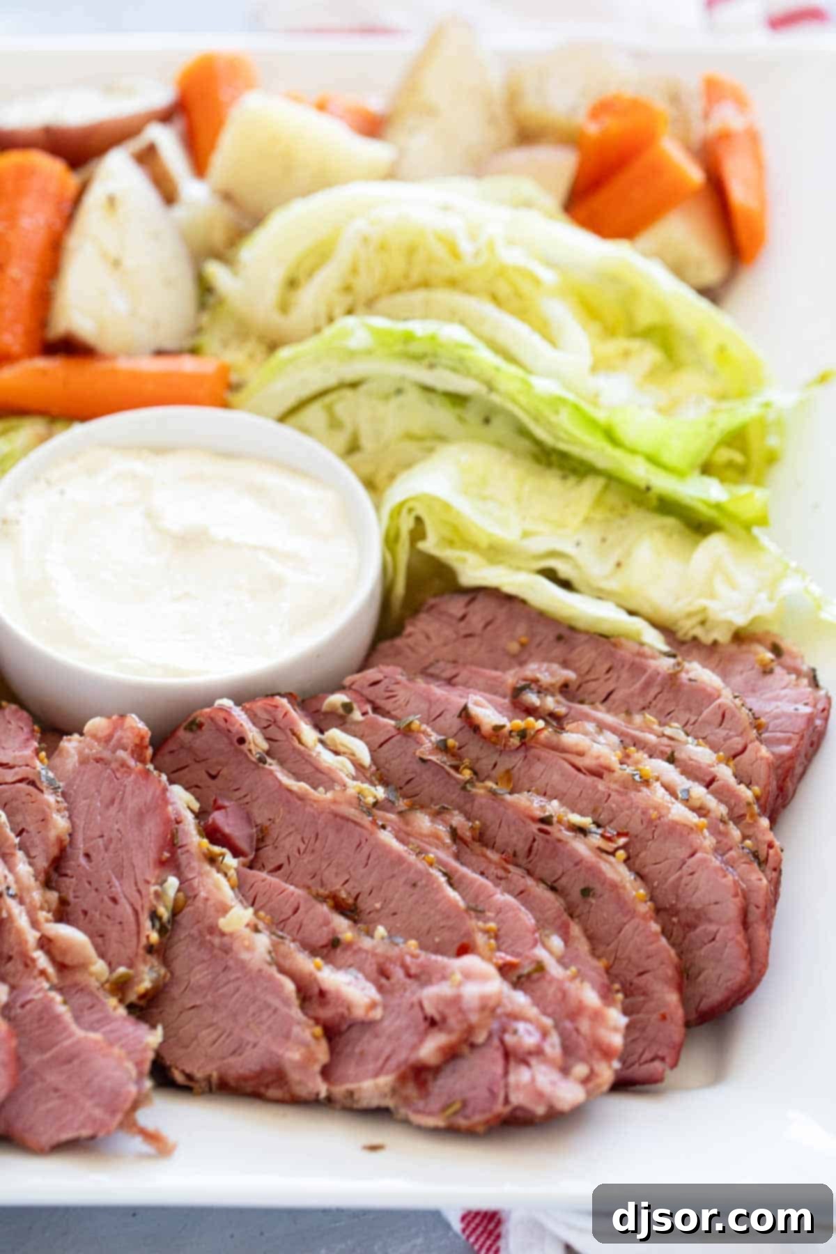 Deliciously Sliced Corned Beef, Cabbage, Potatoes, and Carrots on a Serving Platter