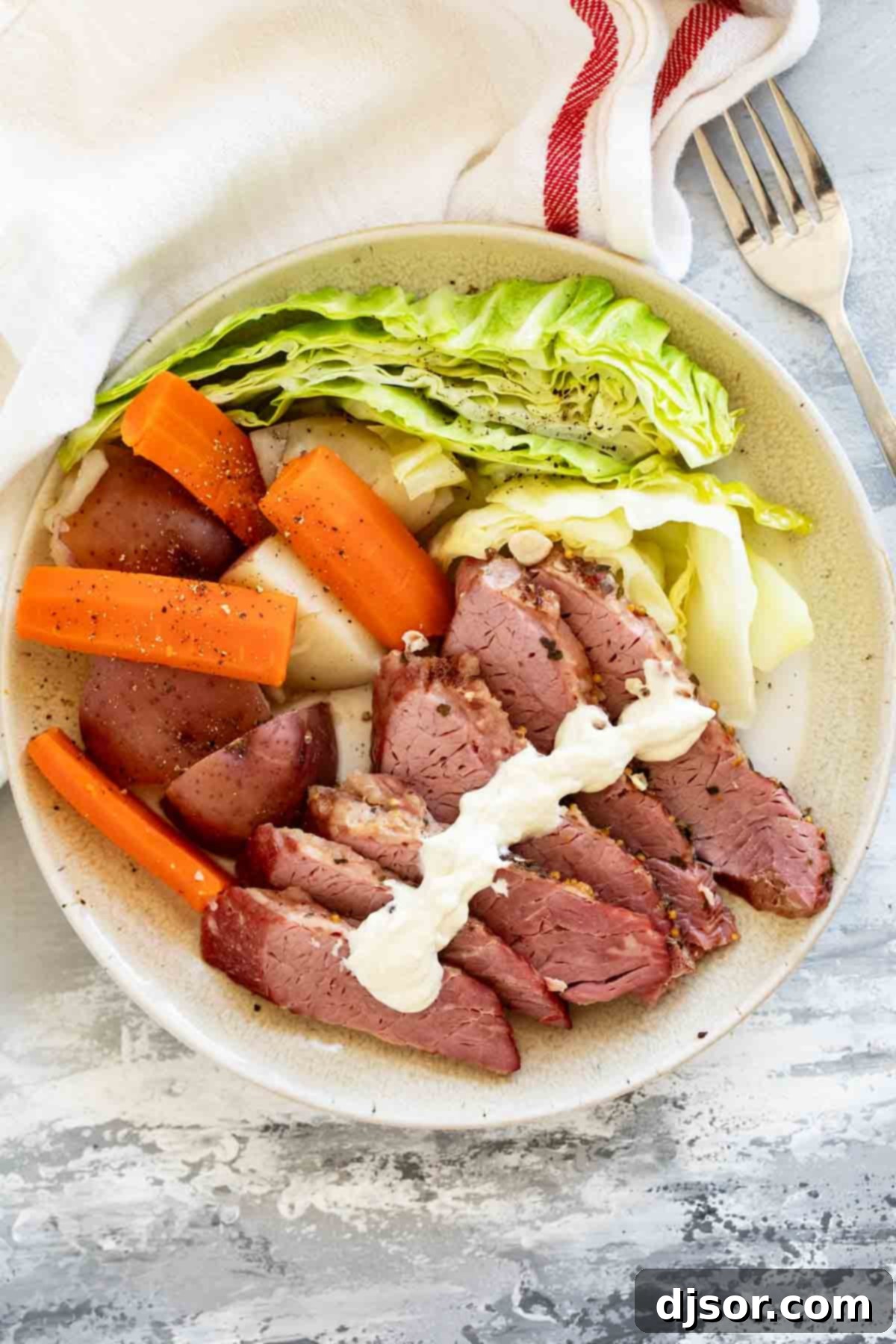 Perfectly Sliced Corned Beef, Cabbage, Potatoes, and Carrots with Creamy Horseradish Mustard
