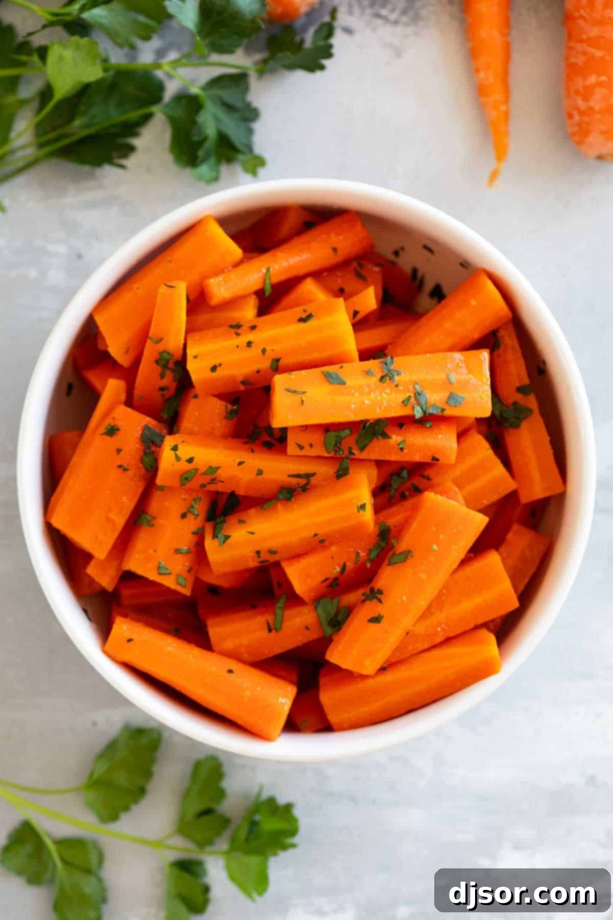 Delicious Slow Cooker Carrots Slow Cooker Carrots in a bowl, ready to serve.